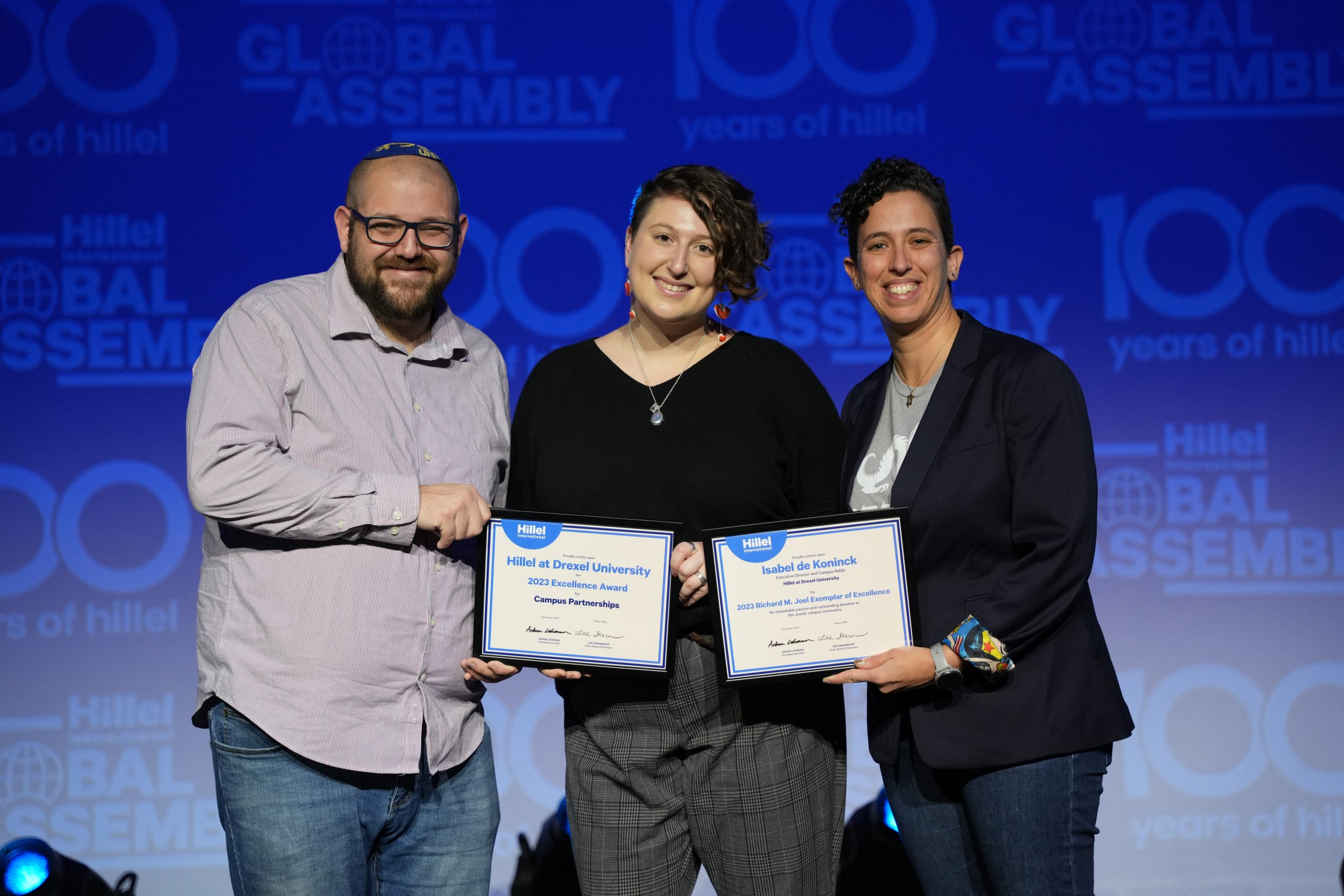 Drexel Hillel staff pose with awards from Hillel Global Assembly